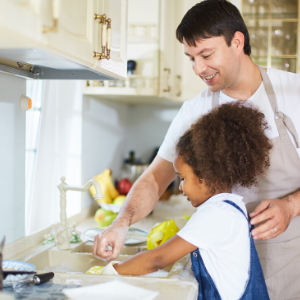 Image of Father/daughter doing dishes